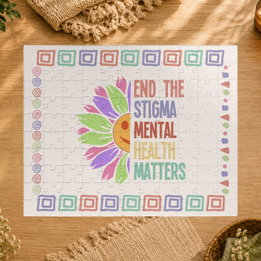 Jigsaw puzzle with a colorful design and text 'End the Stigma Mental Health Matters' on a white background