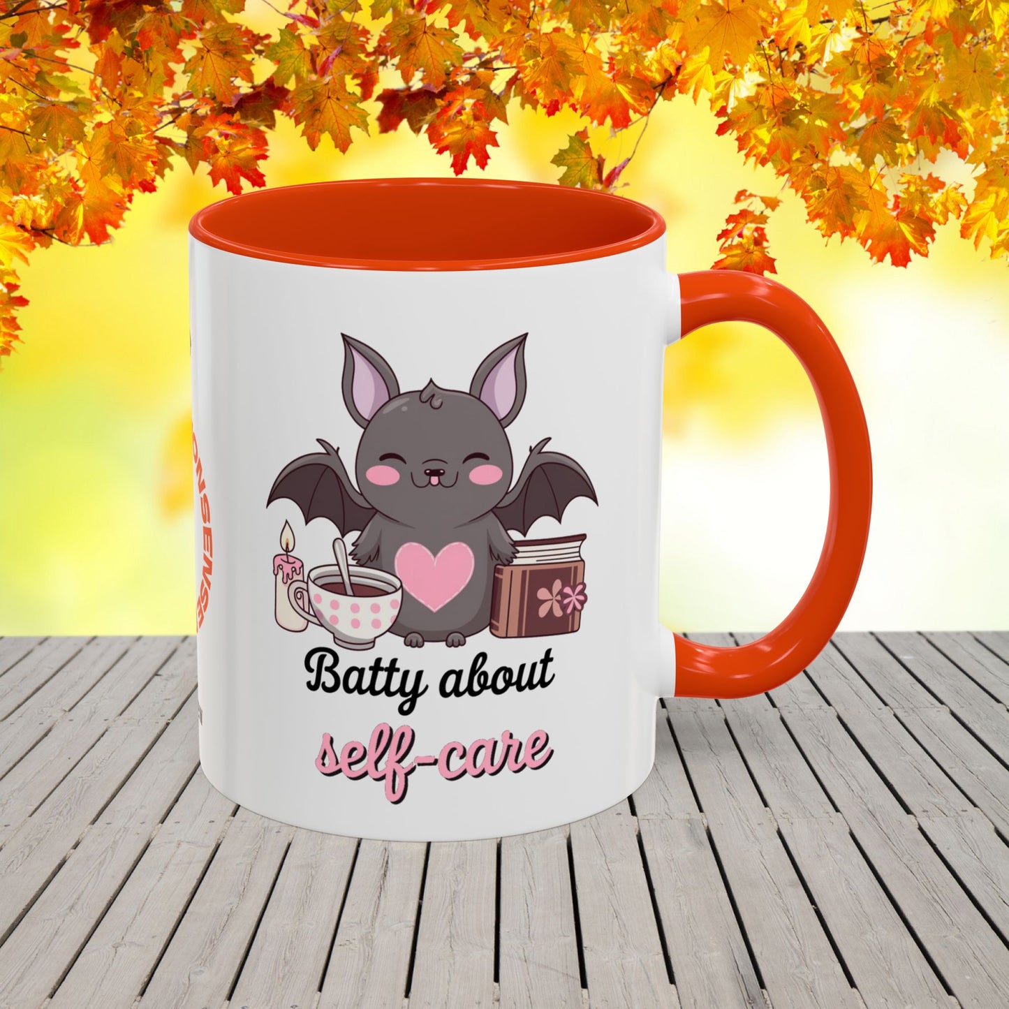 Halloween mug with bat-themed design and self-care message, promoting anxiety relief and mental health awareness