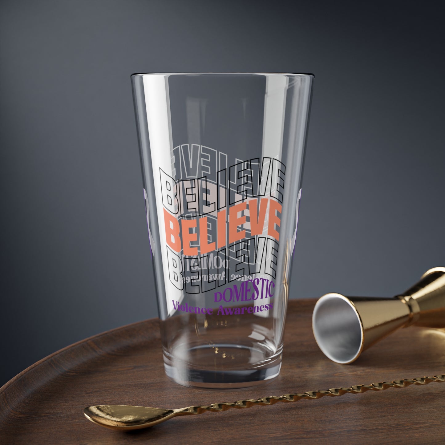Pint glass with Believe Believe Believe and purple ribbon design for DV awareness