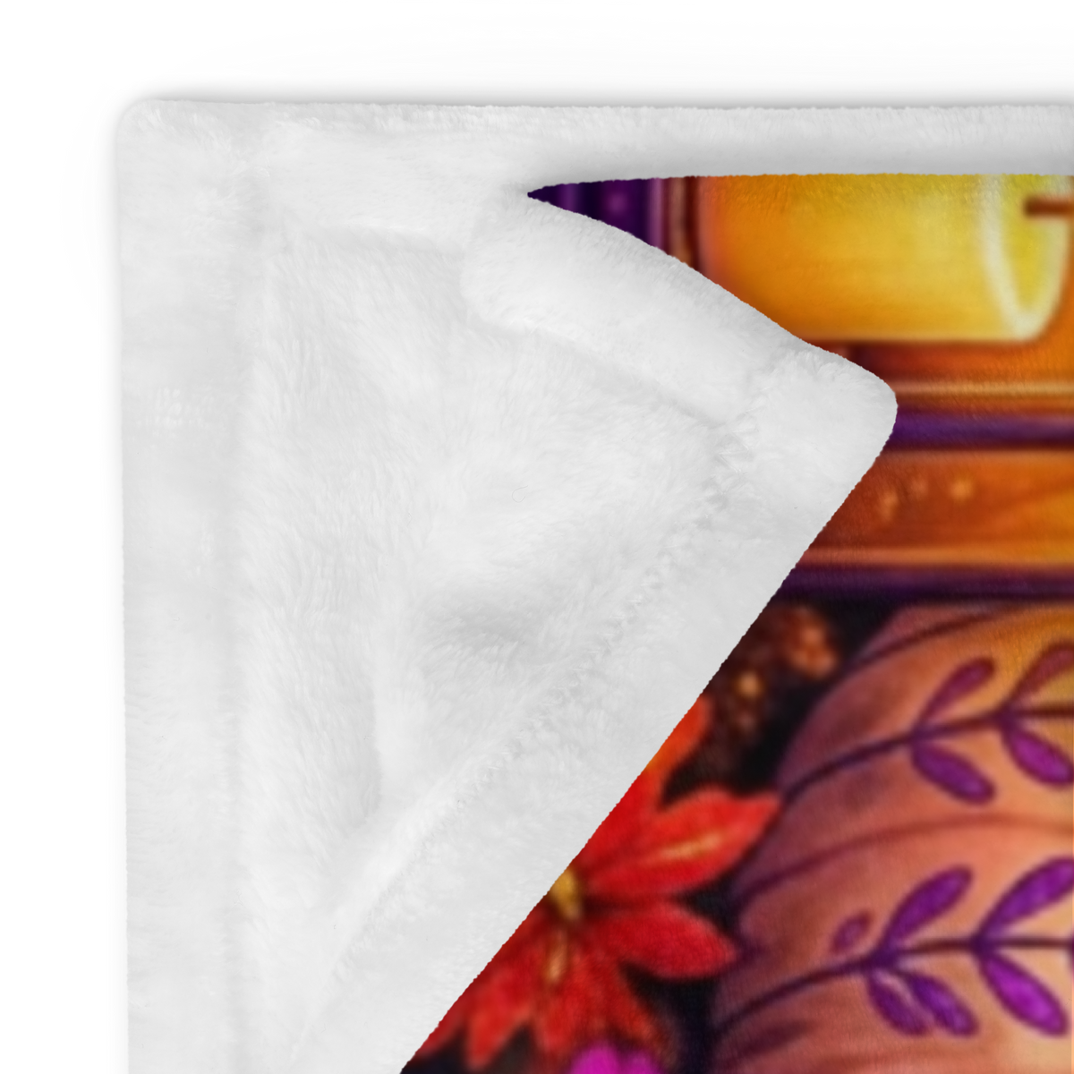 A colorful Halloween-themed blanket with the phrase “Treat Yourself Kindly” in large decorative lettering. The scene shows a smiling ghost in a witch hat holding a mug, surrounded by pumpkins, flowers, a house, candles, and autumn leaves on a purple background.