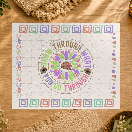 Jigsaw puzzle with motivational quote and colorful design on a white background