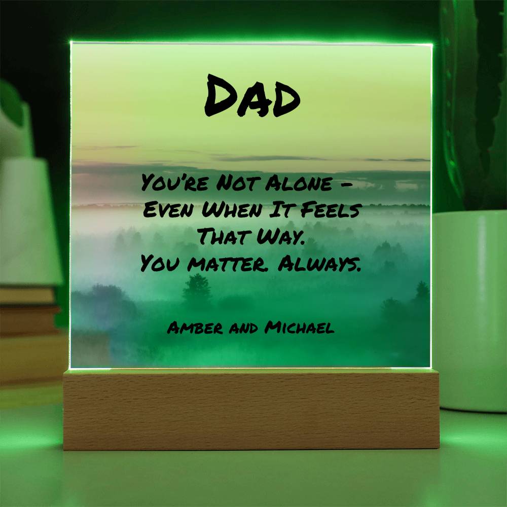 Encouraging message plaque reading “You’re Not Alone,” mental health support gift for fathers.