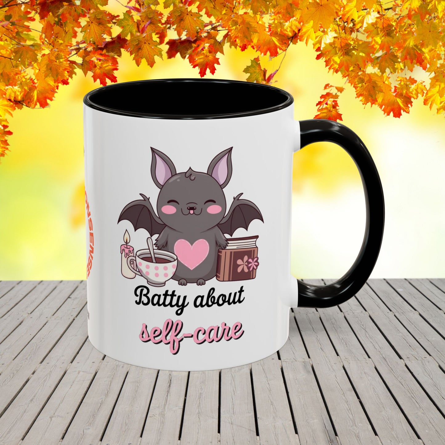 Halloween mug with bat-themed design and self-care message, promoting anxiety relief and mental health awareness