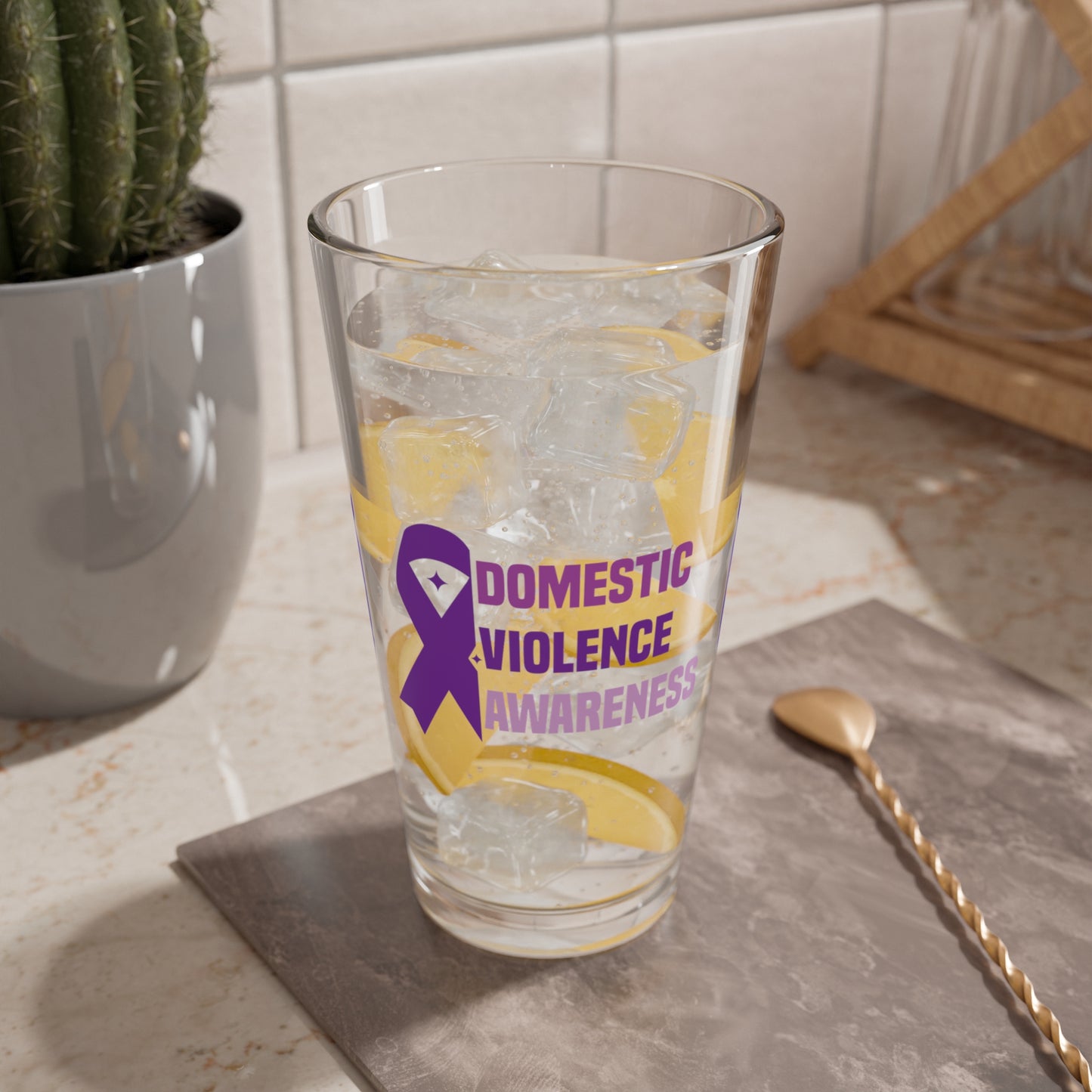 Domestic Violence Awareness pint glass with bold lettering and advocacy message