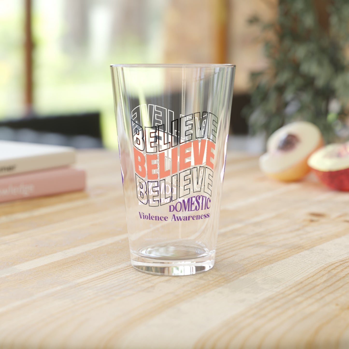 Pint glass with Believe Believe Believe and purple ribbon design for DV awareness