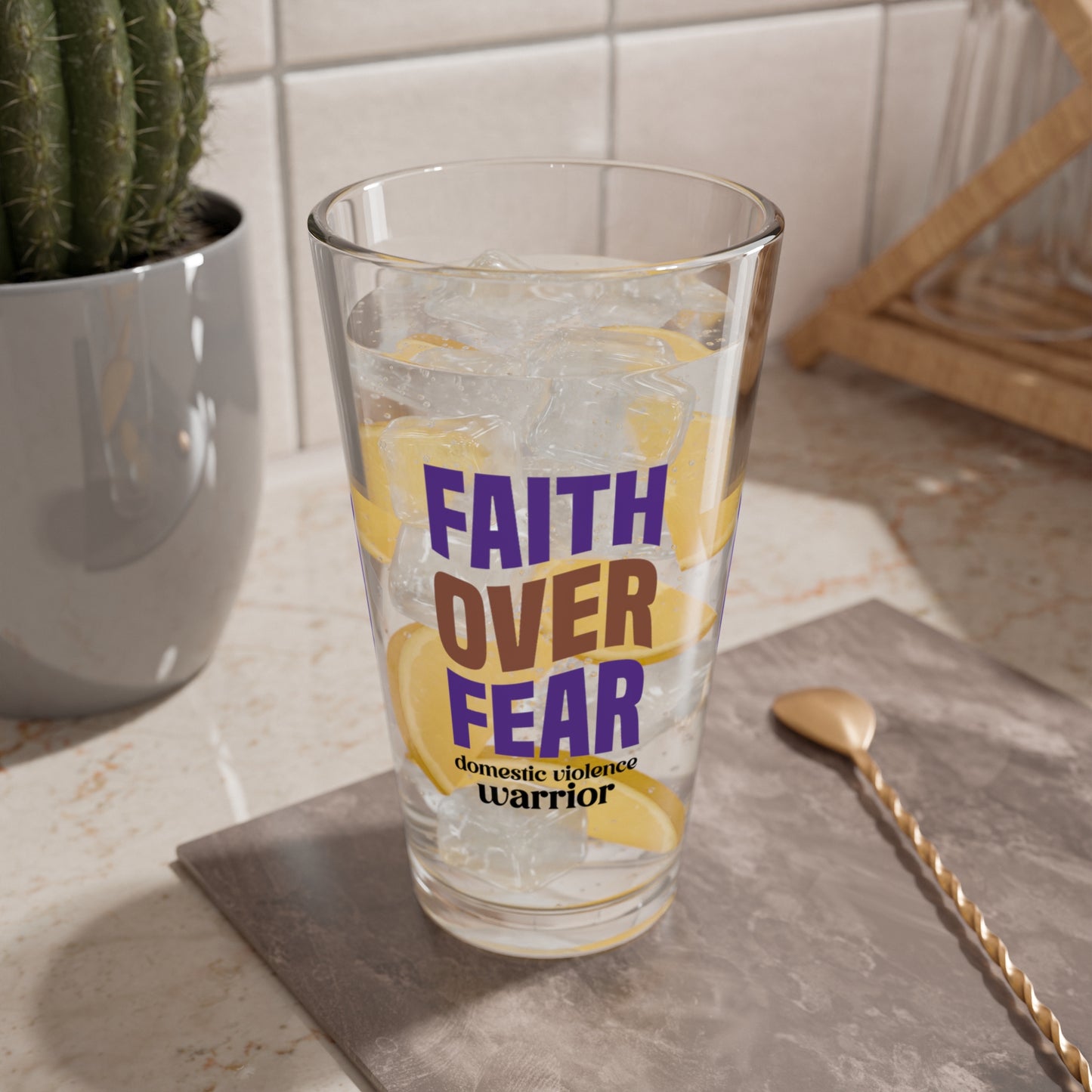 Faith Over Fear Domestic Violence Warrior pint glass with inspiring message