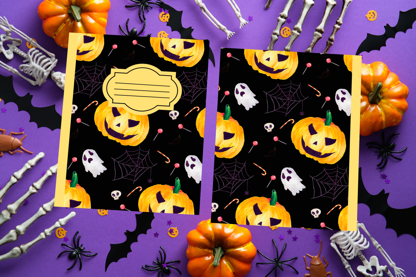 Black Halloween soft cover composition notebook with pumpkin design, wide ruled writing journal for school or journaling