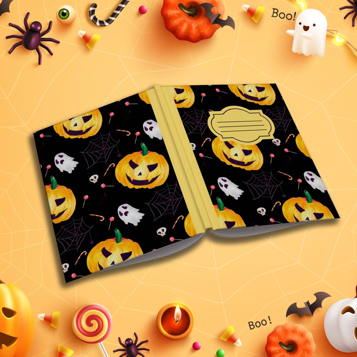 Black Halloween soft cover composition notebook with pumpkin design, wide ruled writing journal for school or journaling