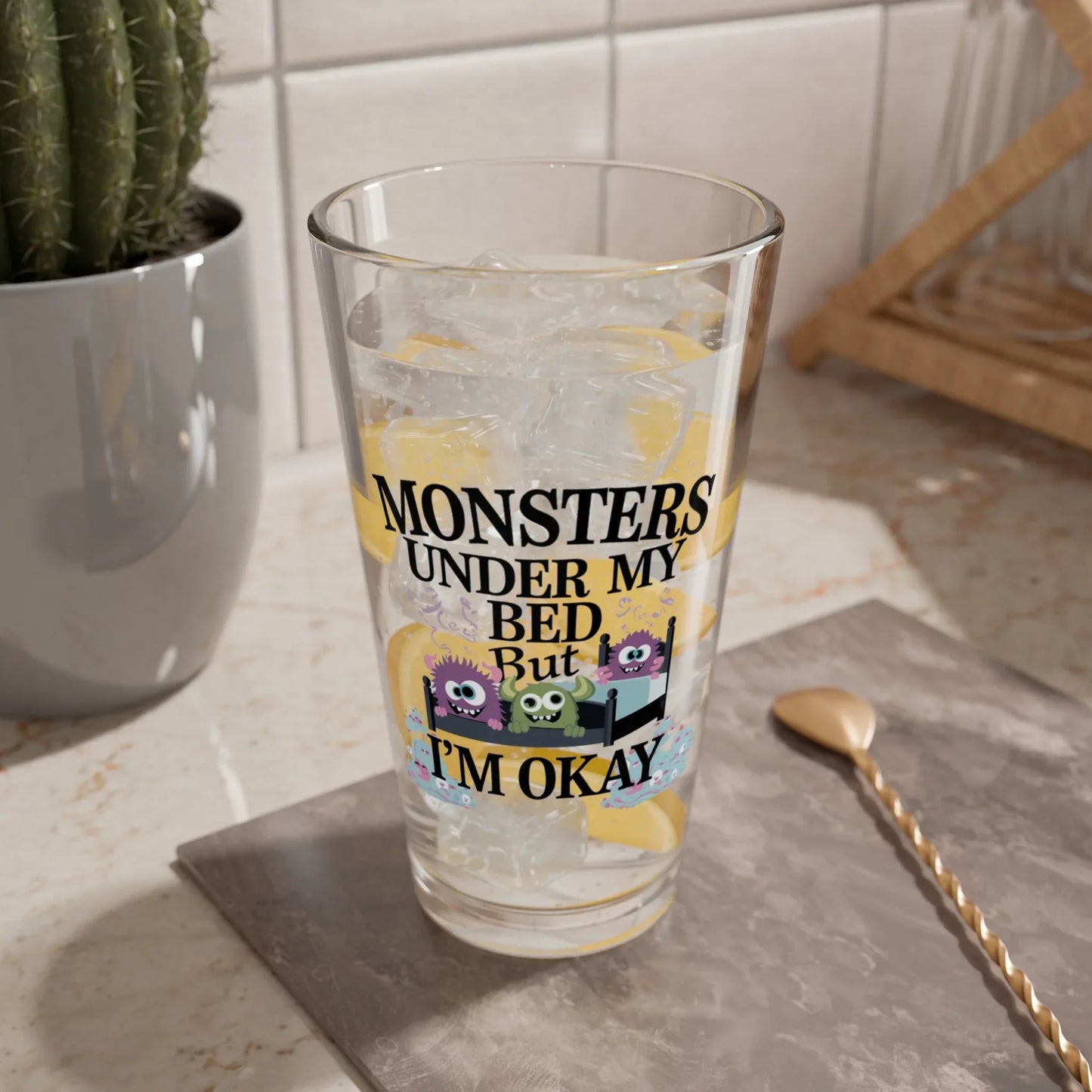 Shop our premium monsters under my bed but im okay halloween pint glass 16oz from MySisterIsASurvivor.