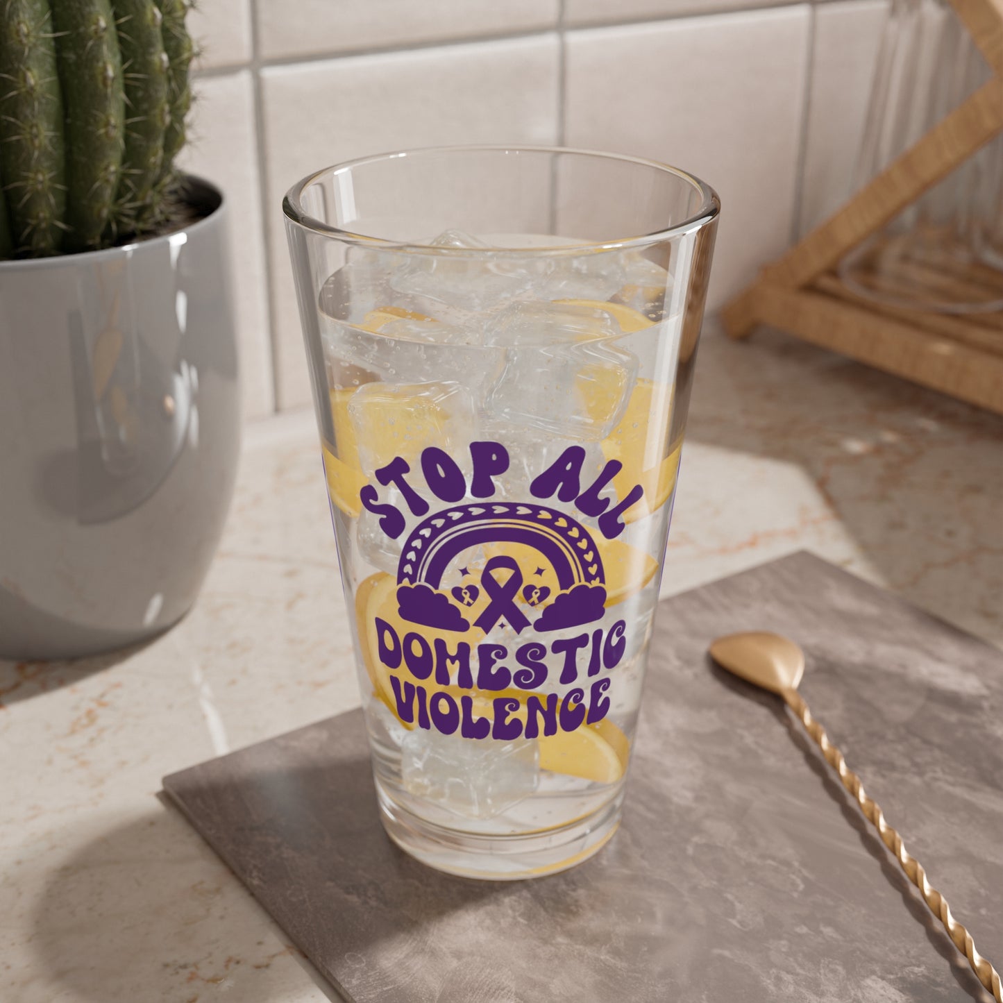 Pint glass with Stop All Domestic Violence design to raise awareness