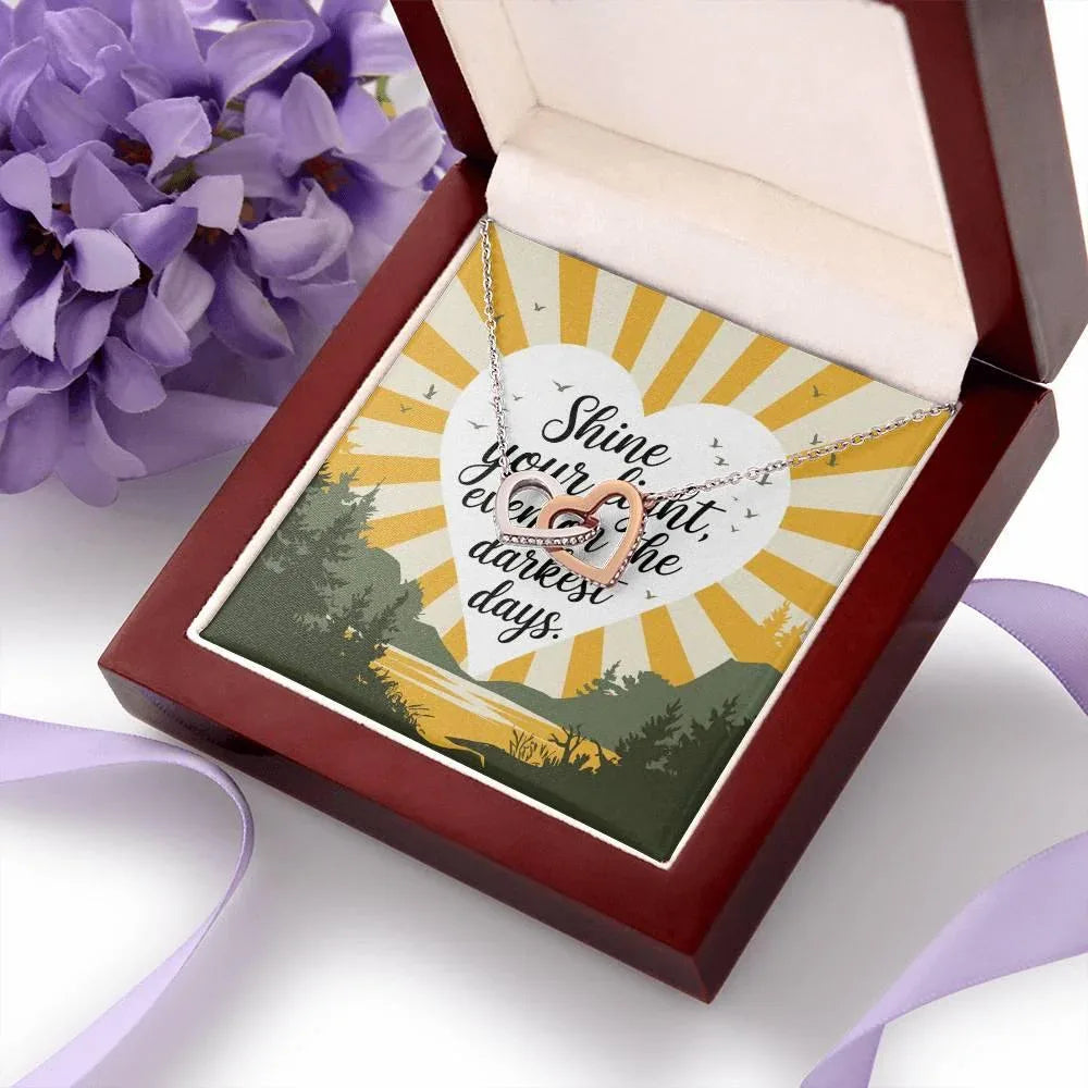 Shop our premium shine your light interlocking hearts necklace from MySisterIsASurvivor.