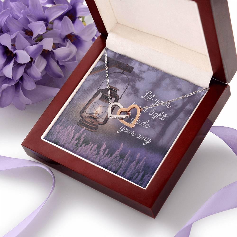 Shop our premium let your inner light guide interlocking hearts necklace from MySisterIsASurvivor.