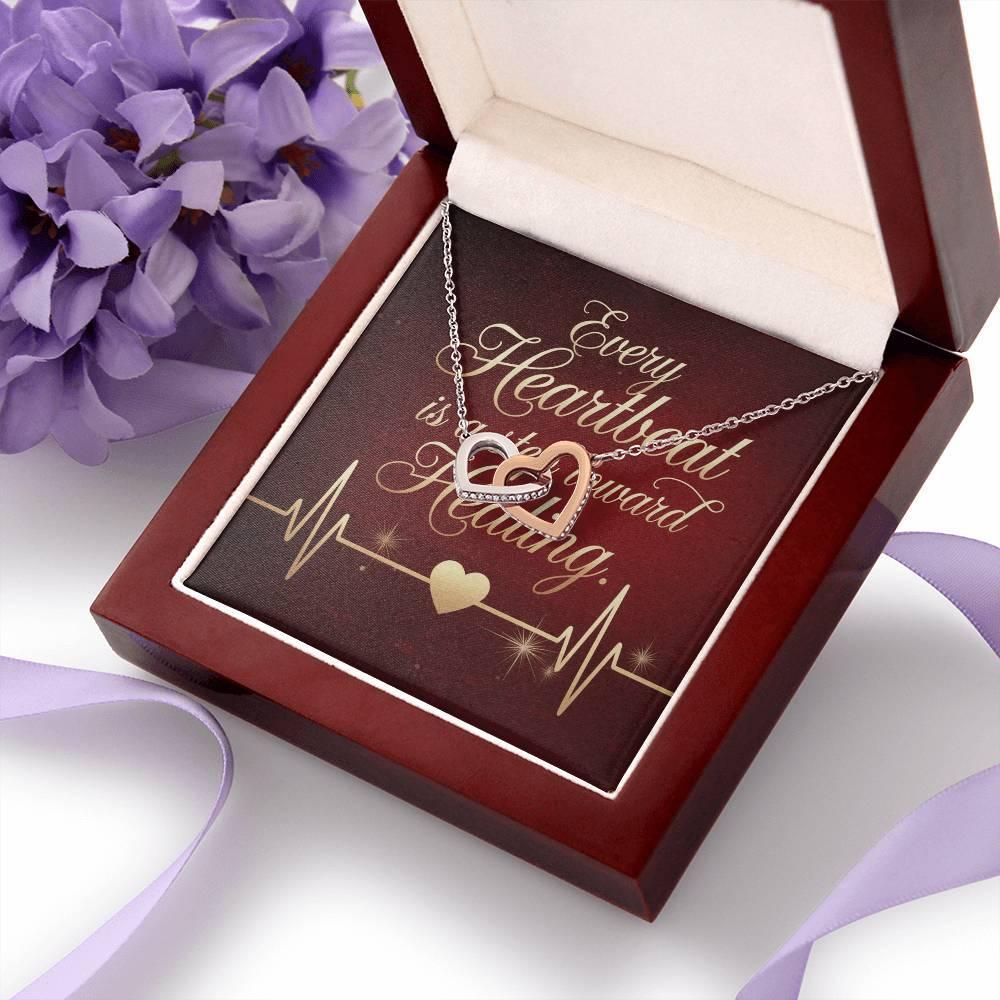 Every Heartbeat Tells Your Story - Interlocking Hearts Necklace symbolic jewelry for strength & courage