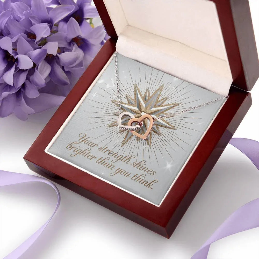 Shop our premium your strength shines interlocking hearts necklace from MySisterIsASurvivor.