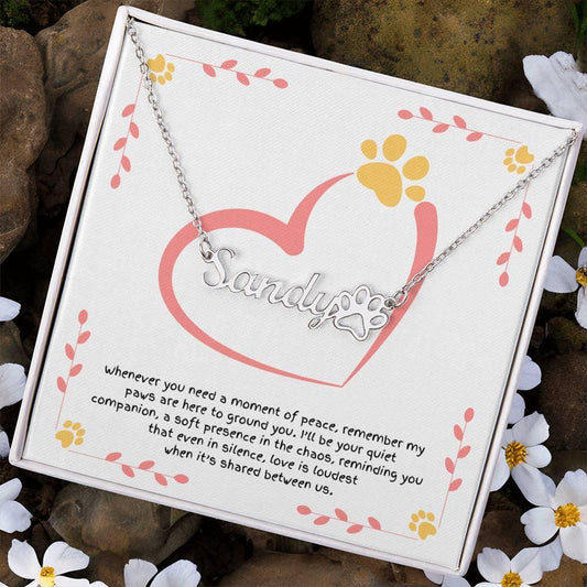 Dog lover necklace with paw print charm, celebrating loyalty, courage, and the trust of walking life’s path together.
