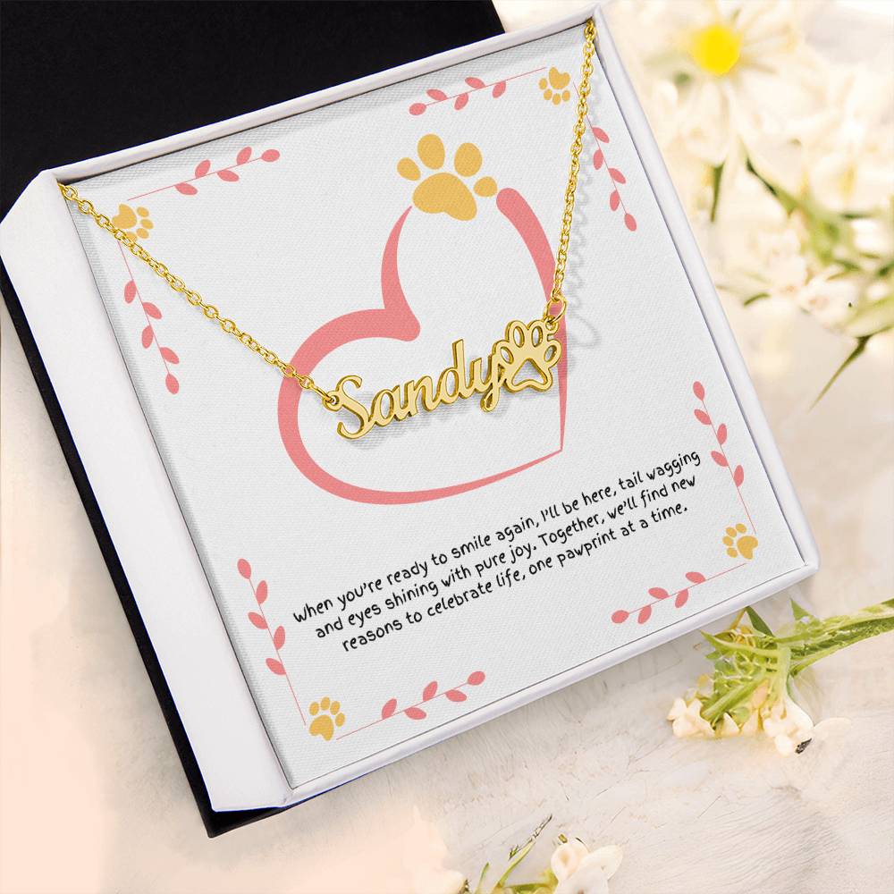 Custom paw print name necklace for dog moms, a reminder of companionship, comfort, and the healing power of paws.