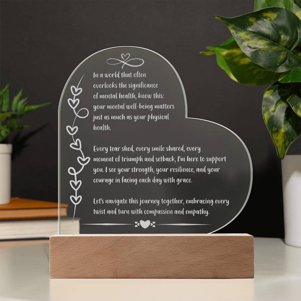 Empowering 7 inch engraved acrylic plaque with LED light and “In a World That Often Overlooks” quote.
