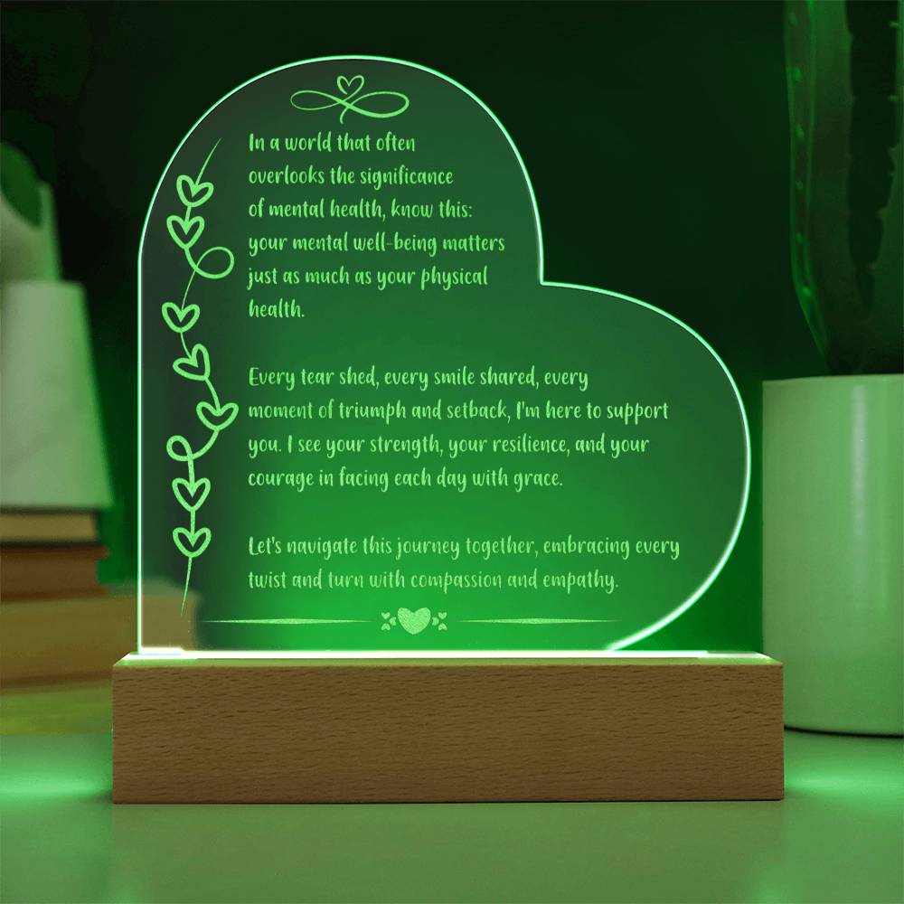 Empowering 7 inch engraved acrylic plaque with LED light and “In a World That Often Overlooks” quote.