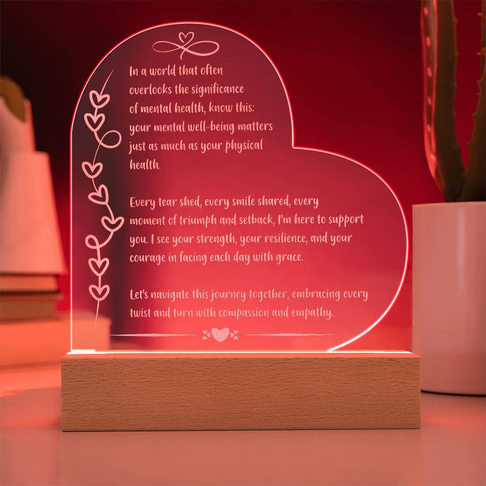 Empowering 7 inch engraved acrylic plaque with LED light and “In a World That Often Overlooks” quote.
