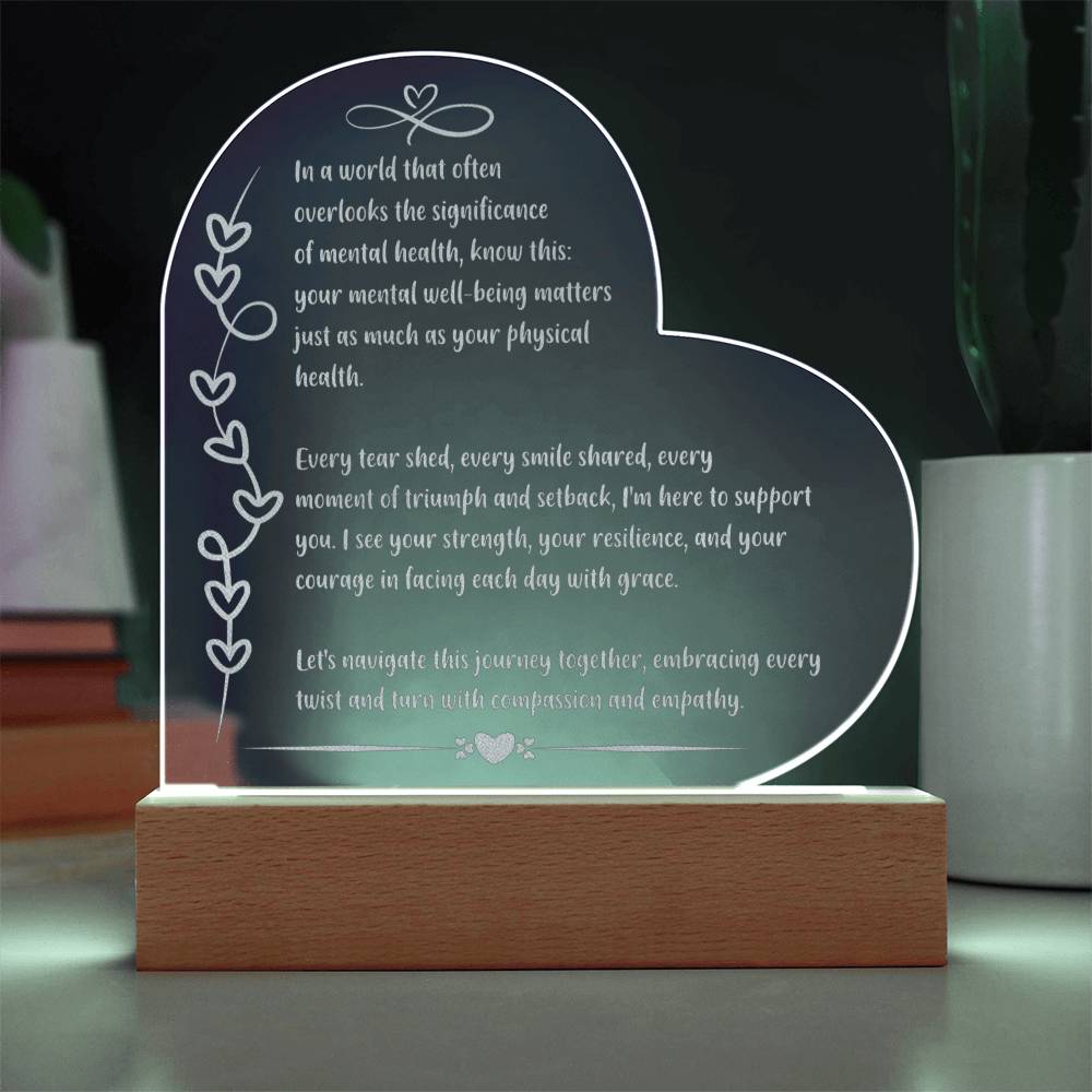 Empowering 7 inch engraved acrylic plaque with LED light and “In a World That Often Overlooks” quote.