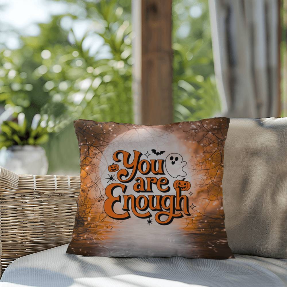 Indoor/outdoor pillow with “You Are Enough” promoting self-love and mental health