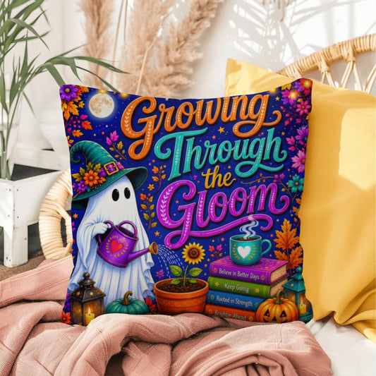 Growing Through The Gloom message on a Halloween throw pillow celebrating resilience and recovery