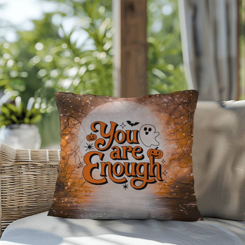 Indoor/outdoor pillow with “You Are Enough” promoting self-love and mental health