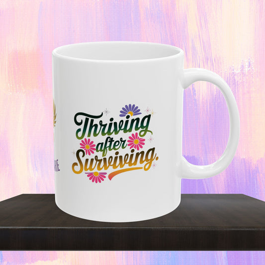 Empowerment mug for thriving after surviving trauma.