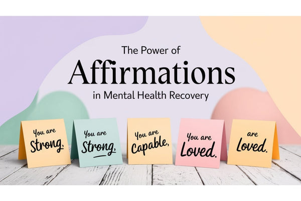 Person writing affirmations in a journal, representing the role of positive self-talk in mental health recovery and trauma healing