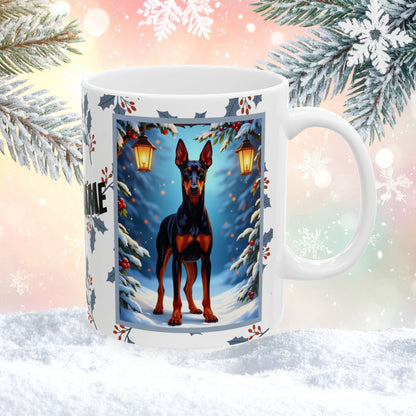 Doberman (Black & Rust) Winter Mug - black and rust Doberman illustrated standing proudly in a snowy winter scene with pine branches