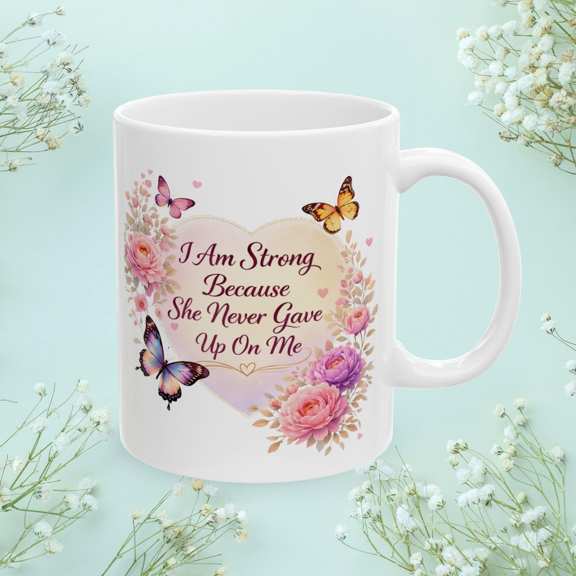 Shop our premium i am strong because she never gave up on me mug from MySisterIsASurvivor.