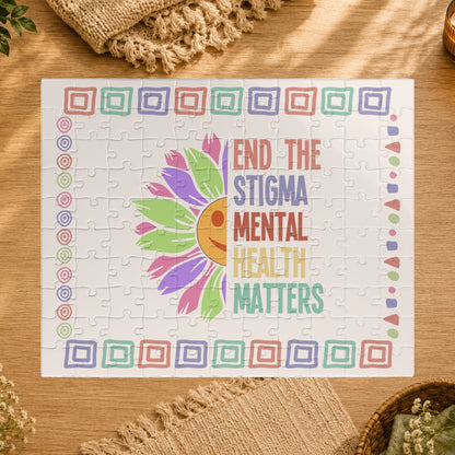 Jigsaw puzzle with a colorful design and text 'End the Stigma Mental Health Matters' on a white background