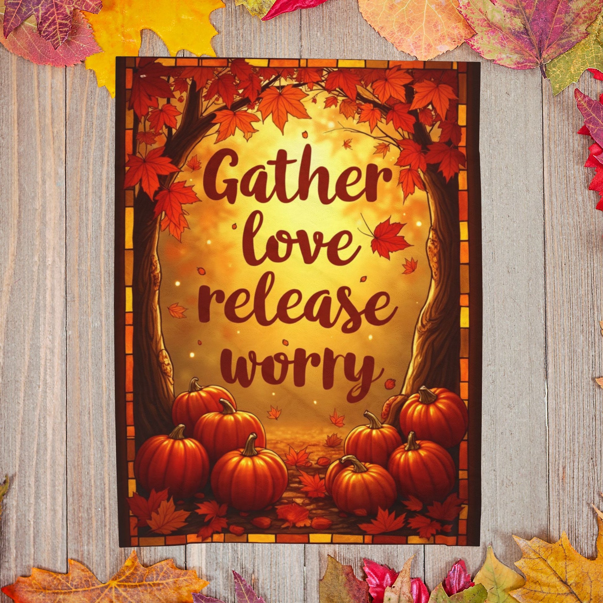 Cozy blanket with “Gather Love, Release Worry,” peaceful fall-themed design promoting calm and gratitude.