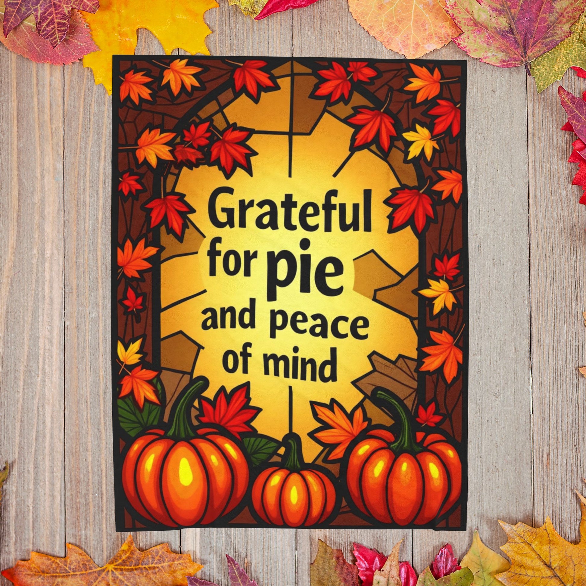 Thanksgiving blanket with “Grateful for Pie and Peace of Mind,” cheerful fall colors and cozy pie art.