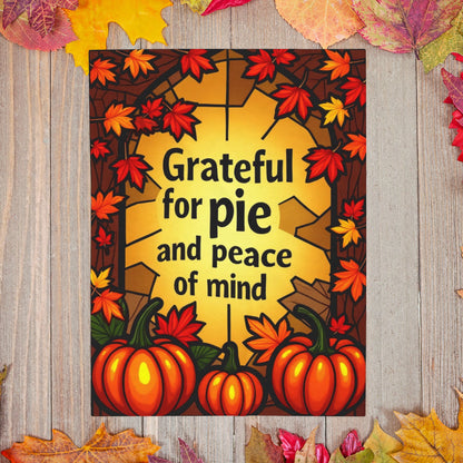 Thanksgiving blanket with “Grateful for Pie and Peace of Mind,” cheerful fall colors and cozy pie art.