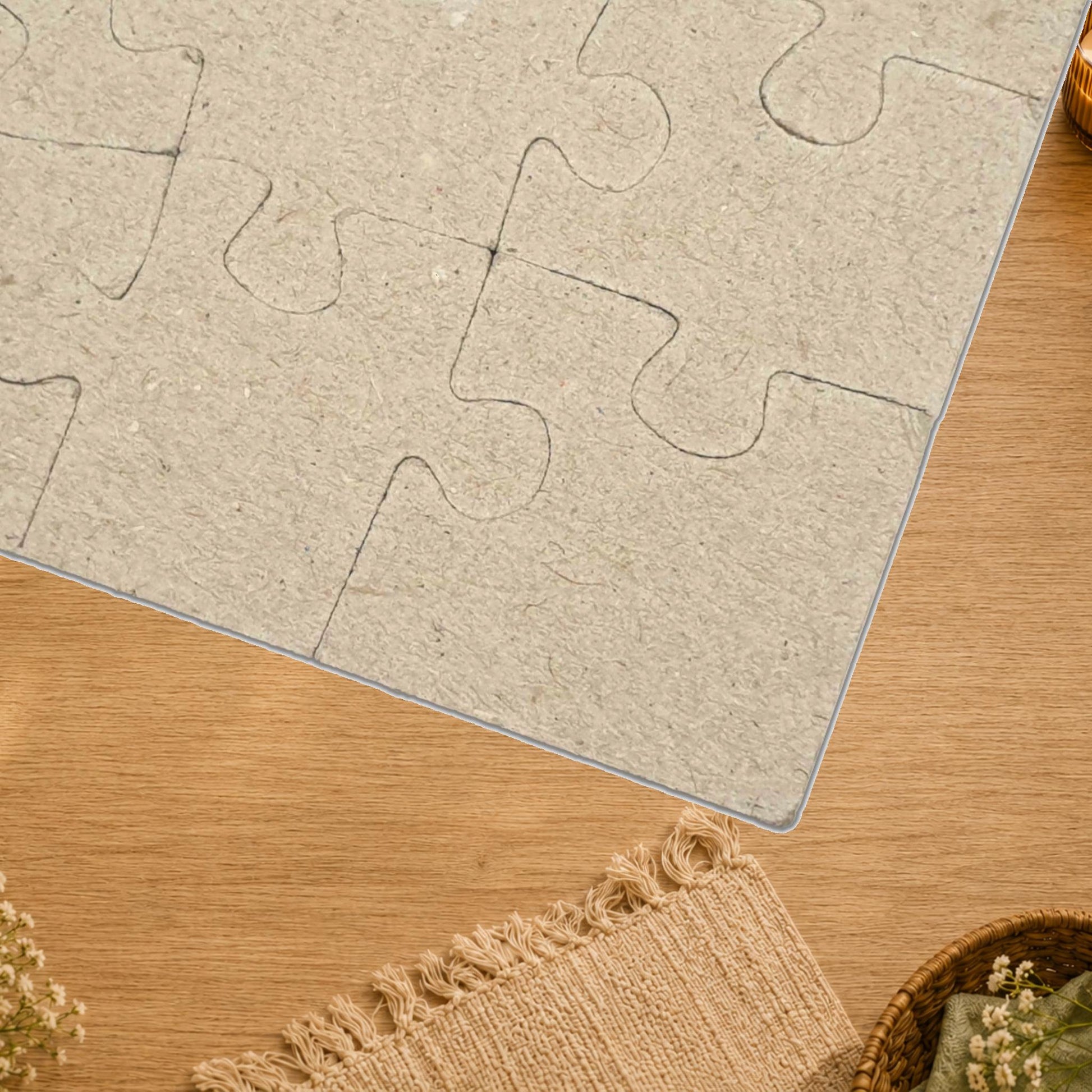 Cardboard puzzle pieces on a white background