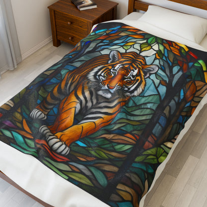 A fierce tiger blanket with stained glass-style art that combines power, color, and coziness.