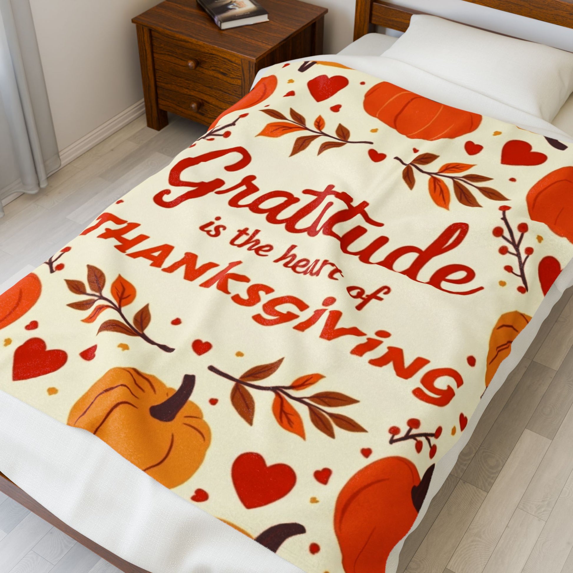 Thanksgiving blanket with “Gratitude Is the Heart of Thanksgiving,” cozy seasonal gratitude design.