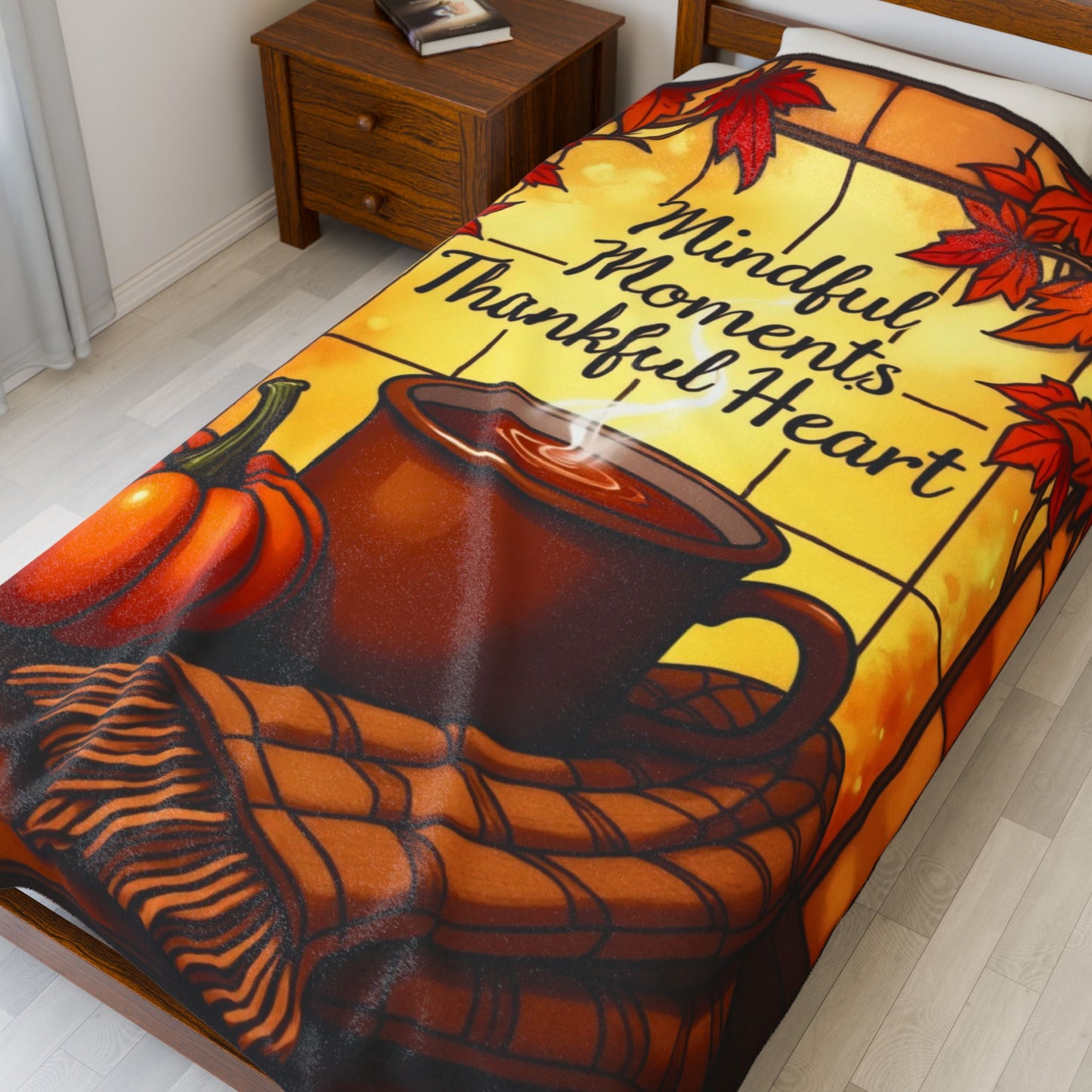 Cozy blanket with “Mindful Moments, Thankful Heart,” autumn mindfulness theme in warm orange and red.