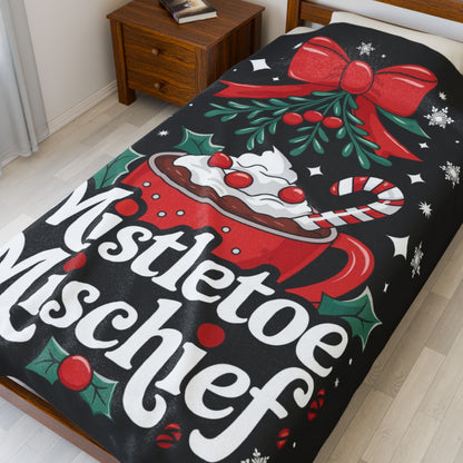 Holiday blanket “Mistletoe Mischief” cute Christmas throw with festive winter design for cozy fun