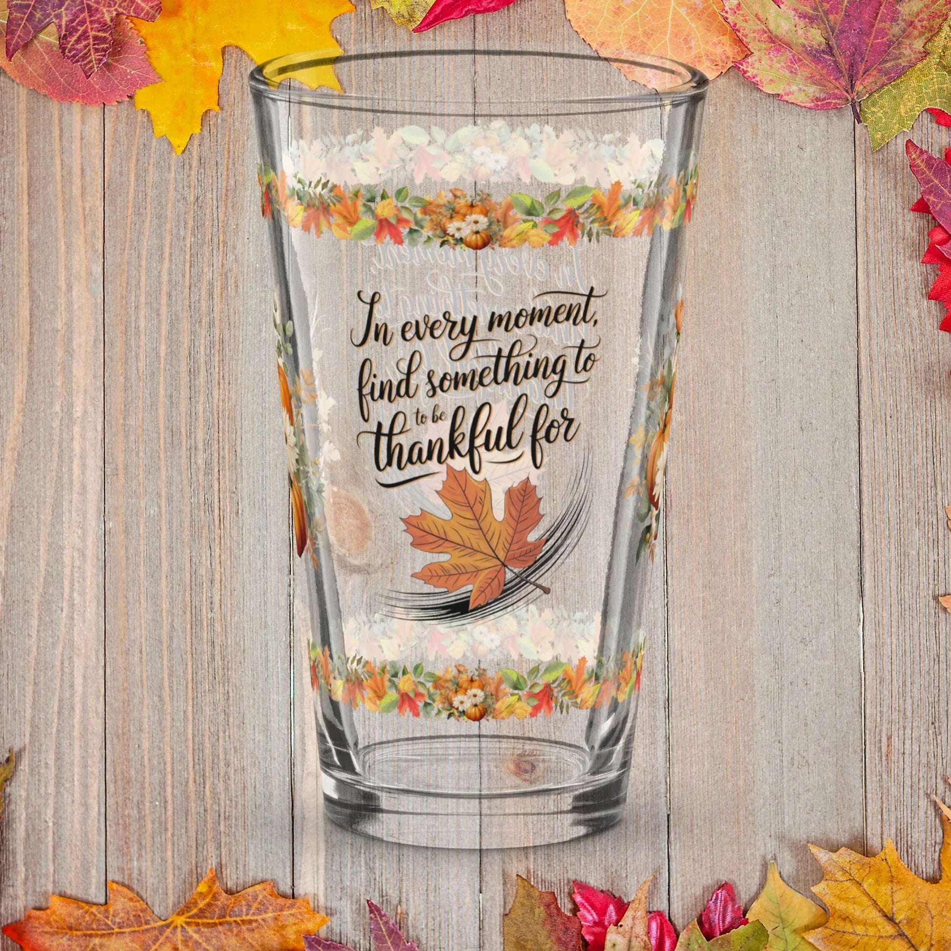 Shop our in every moment find something thanksgiving pint glass 16oz featuring the 16oz style option from MySisterIsASurvivor.
