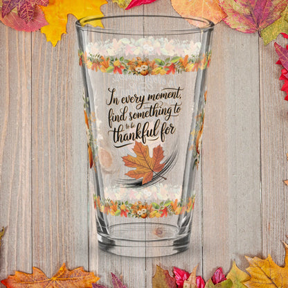 Shop our in every moment find something thanksgiving pint glass 16oz featuring the 16oz style option from MySisterIsASurvivor.