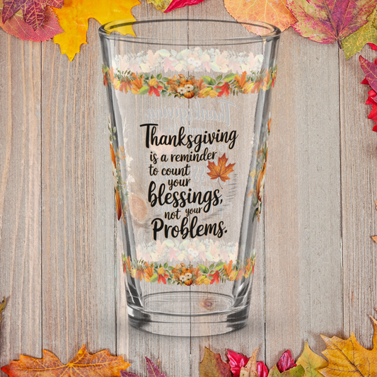 Thanksgiving awareness glass reminding to “Count Blessings, Not Problems”