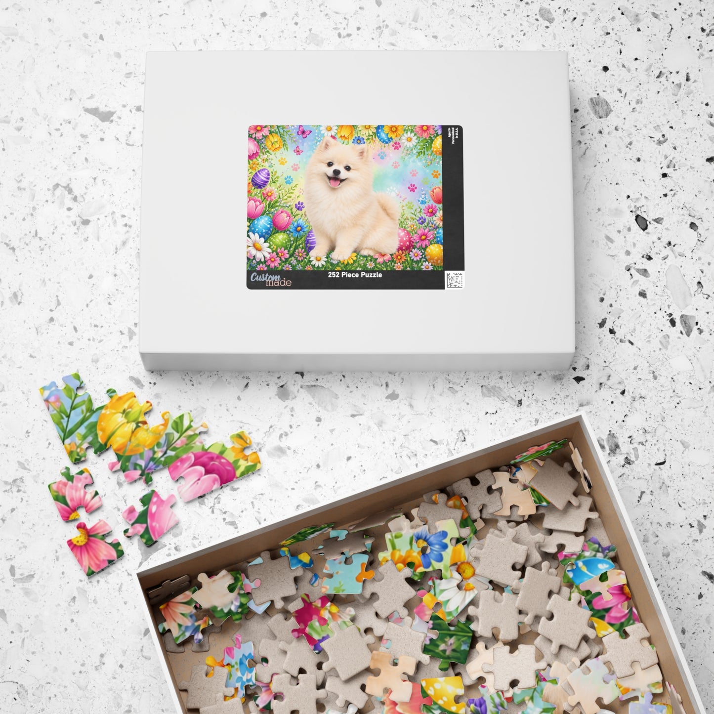 Pomeranian (Cream) Easter Puppy Puzzle - Spring Garden with Eggs, Tulips, and Daisies