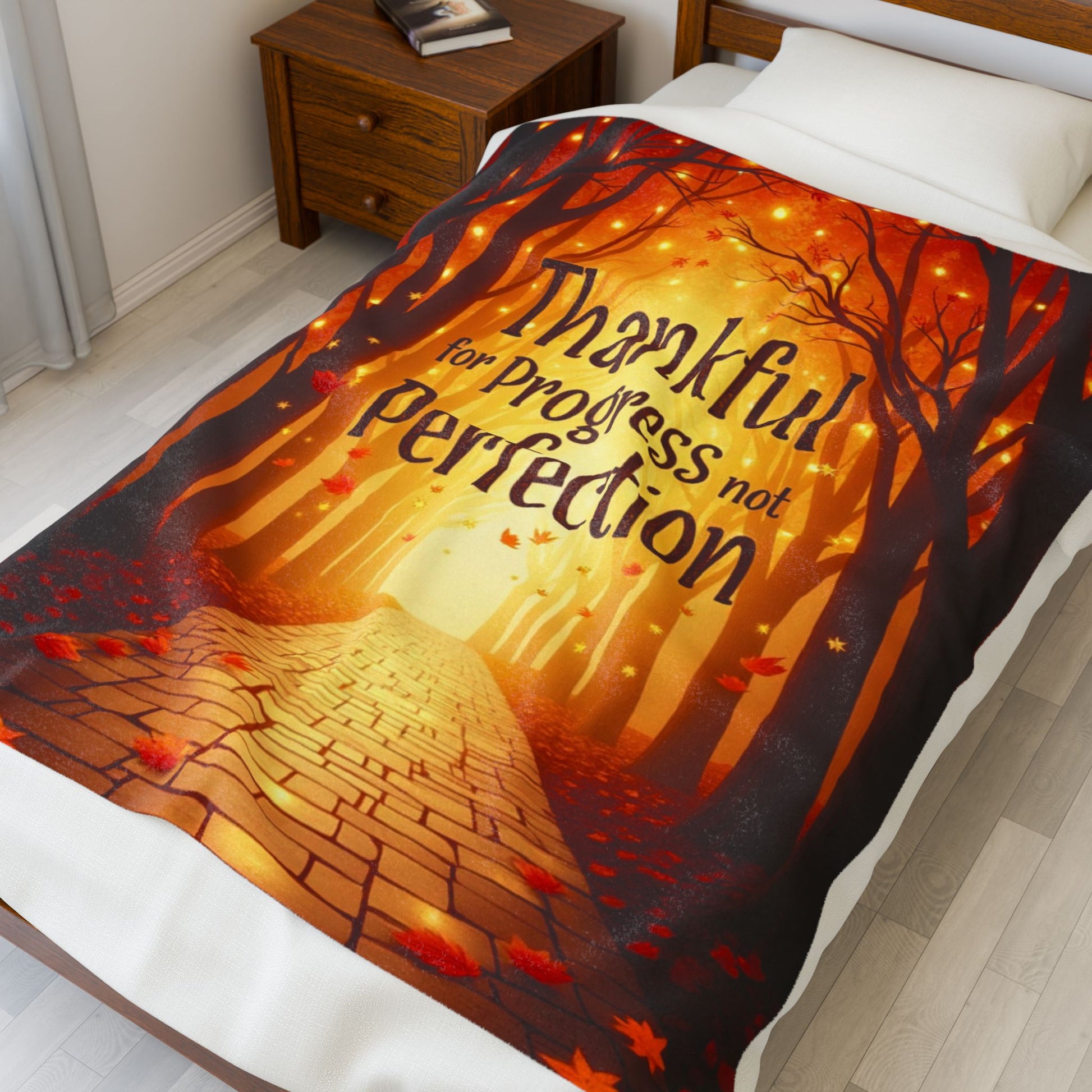 Mindful motivation blanket with “Thankful for Progress, Not Perfection,” calming fall color palette.