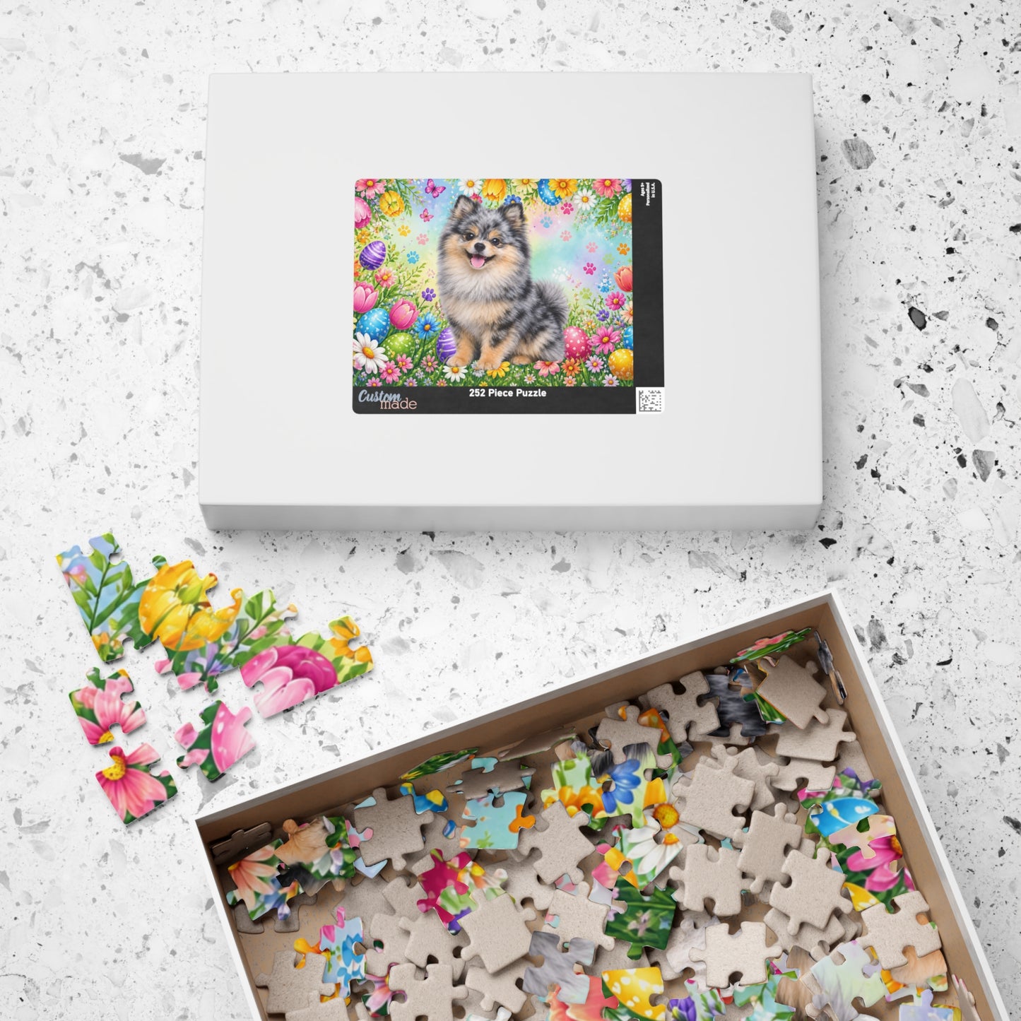 Pomeranian (Blue Merle) Easter Puppy Puzzle - Spring Garden with Eggs, Tulips, and Daisies