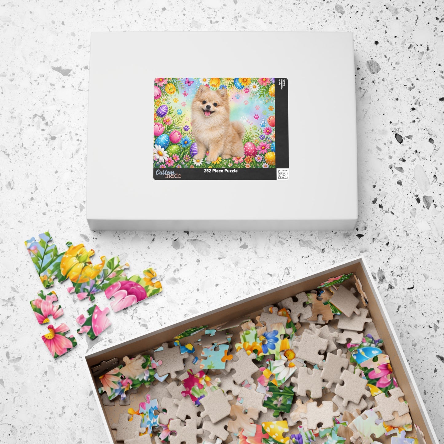 Pomeranian (Cream Merle) Easter Puppy Puzzle - Spring Garden with Eggs, Tulips, and Daisies