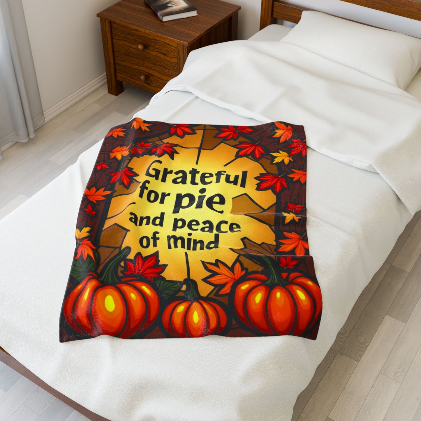 Thanksgiving blanket with “Grateful for Pie and Peace of Mind,” cheerful fall colors and cozy pie art.
