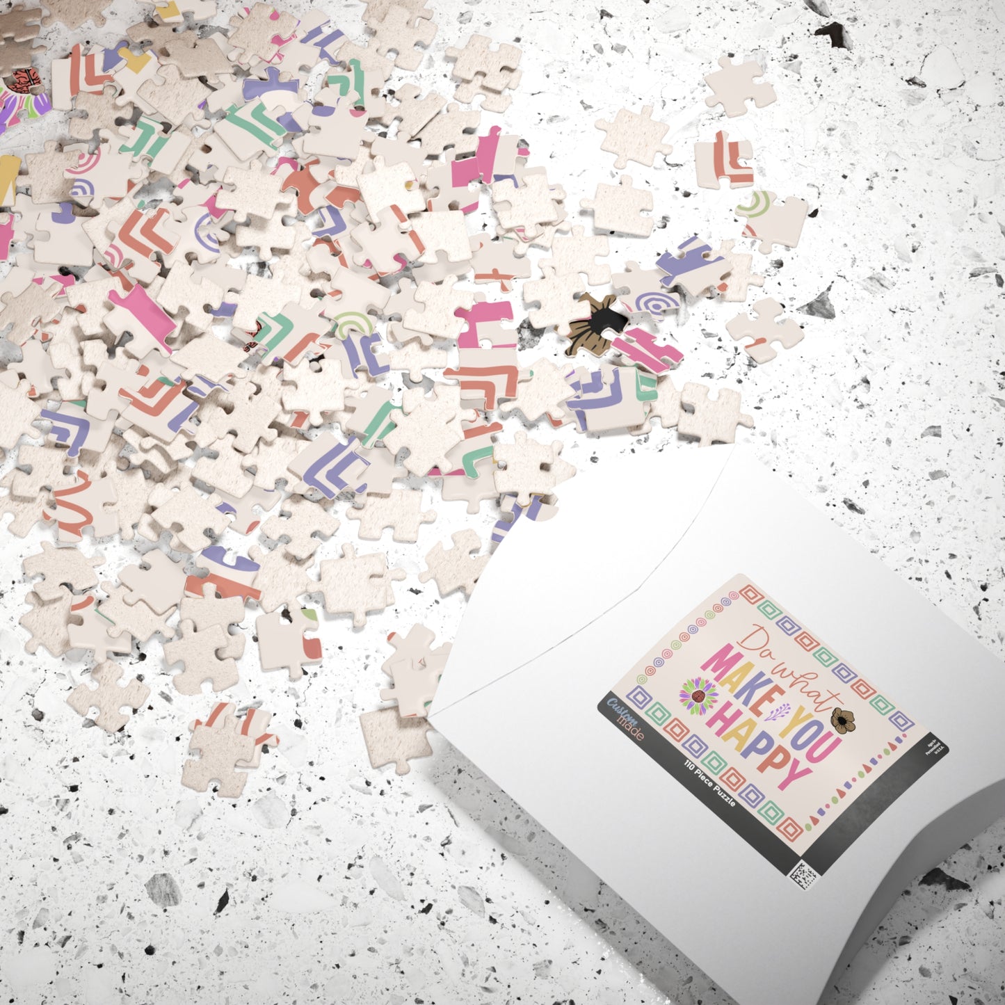 Puzzle with colorful pieces on a white surface