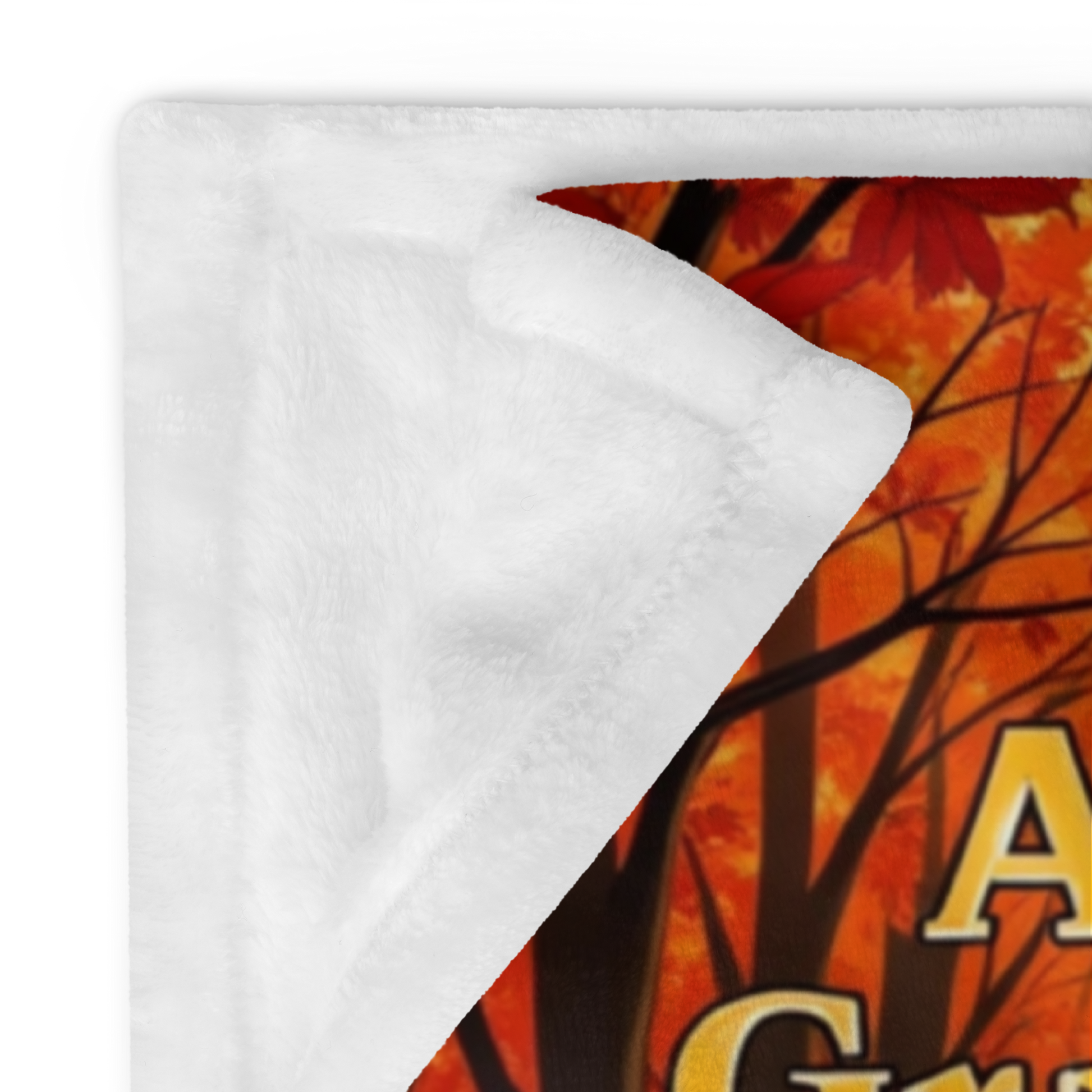 Soft fall blanket with quote “A Little Gratitude Goes a Long Way,” cozy autumn mindfulness design in warm tones.